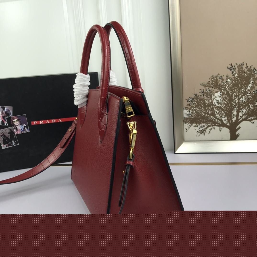 Pra*a top handle bags